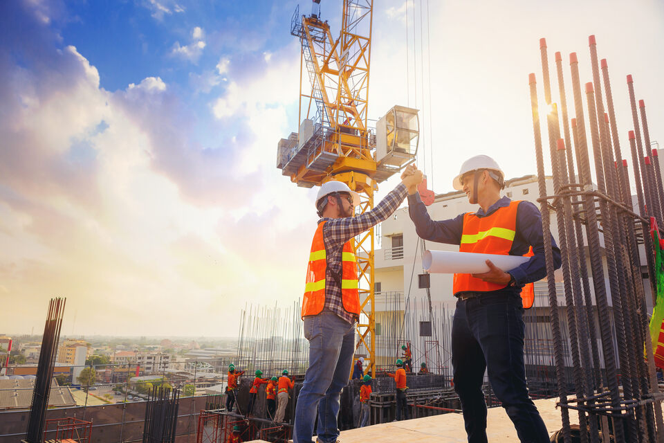 Construction workers celebrating